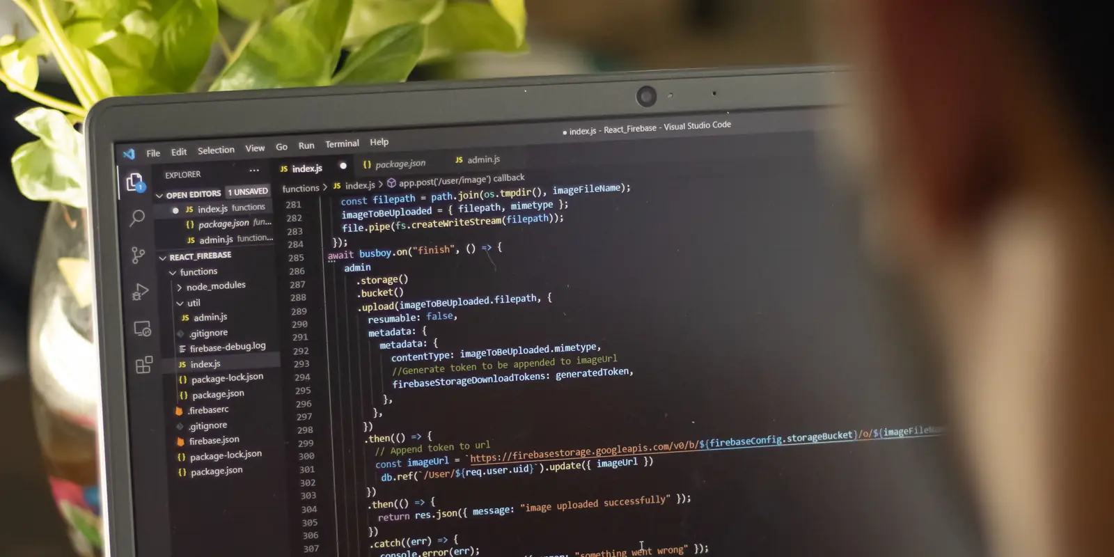 Developer writing React code in Visual Studio Code